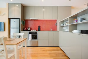 The fully furnished kitchen comes with a dishwasher for easy clean-up.
