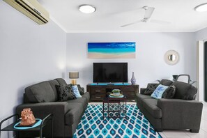 Relax on an extra comfortable lounge suite complete with smart TV and multiple entertainment options.