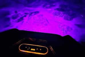 Indulge in ultimate relaxation under the stars in our spacious 6-person hot tub, featuring cascading jets, a backlit waterfall, and a multi-colored light package. Enjoy the perfect ambiance for a calming soak after a day of adventure! ✨