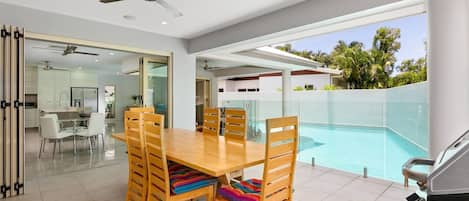 Soak up Queensland's balmy weather while dining alfresco beside the sparkling swimming pool.