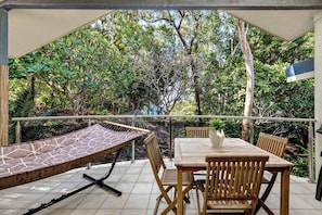 Relax in the hammock or get together as you fire up the BBQ on the balcony overlooking the green surrounds.