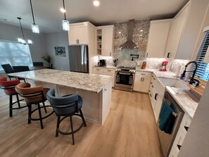 Kitchen with granite throughout