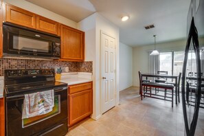 Kitchen | Coffee Maker | Cooking Utensils | Dining Area