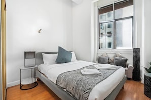 Rest easy in the queen bed in the first bedroom fitted with hotel quality linen with built-in wardrobes offering plenty of storage.