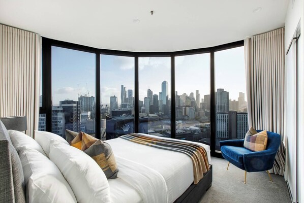 The primary bedroom features wrap around views that you will never get tired of. Wake up to sunshine or pull across the curtains for a shaded sleep in. 