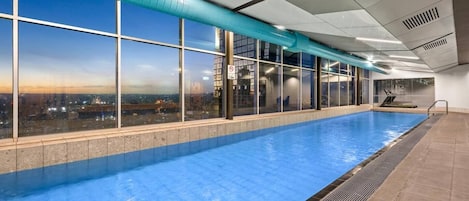 Make use of the indoor rooftop pool with panoramic views over the Melbourne skyline.