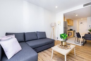 Open plan living makes the apartment feel spacious and welcoming.