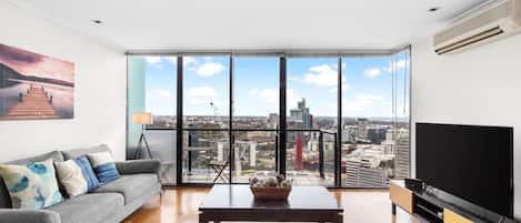 Kick back in front of the TV, enjoying uninterrupted views of the soaring CBD skyline.
