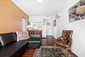 Open plan living features split-system heating and cooling.