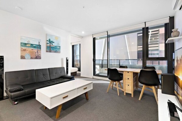 Kick back on the leather sofa in front of the TV with Netflix.