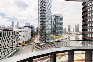 A small balcony offers the perfect lookout across the CBD skyline and Yarra river.