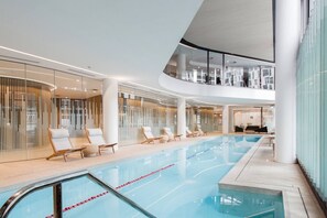 Make use of the building's shared amenities, including a luxurious indoor pool and gym.