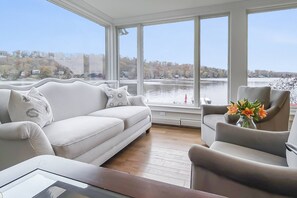 Seamless connection to nature:  The open floor plan provides stunning lake views.