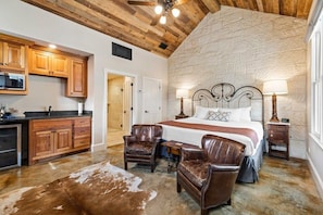 Bed, kitchen and living area