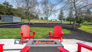 Embrace the warmth of cozy nights by the fire pit.