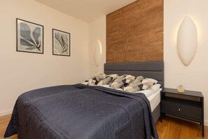 Comfortable double bed in the bedroom. 