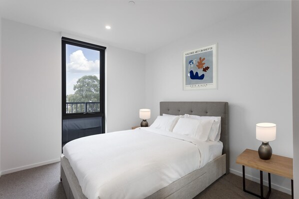 Spacious bedroom with a comfy King bed to keep you well-rested during your stay