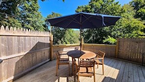 Private back deck with wooded view