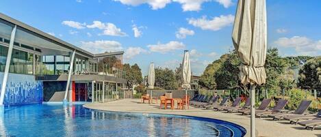 Make a splash in the solar-heated outdoor swimming pool. It’s surrounded by day beds where you can soak up the sun.