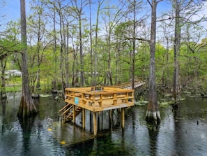 Two story dock with lots of bench seating and water access. 