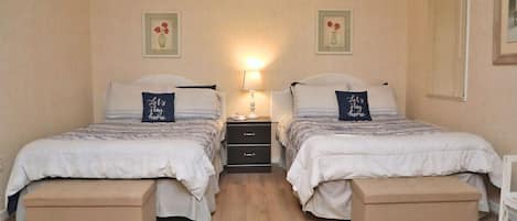 Double, full size beds with private, full bath stocked with basic toiletries.