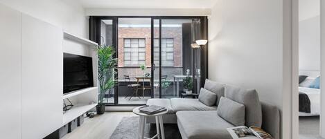 Showcasing sleek and streamlined interiors, this apartment is made for low-maintenance city living.