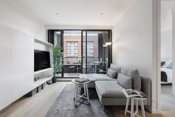 Showcasing sleek and streamlined interiors, this apartment is made for low-maintenance city living.
