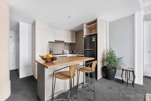 Enjoy your morning coffee up at the breakfast bar or use this as a dedicated workspace for your laptop.
