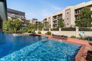 A resort-style pool offers a sun-soaked shared space to send summer days.