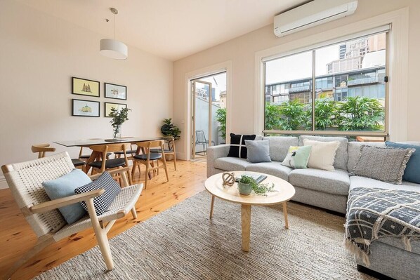 Stylish furnishings and full length windows create bright airy spaces to relax and absorb the wonderful energy this home provides.