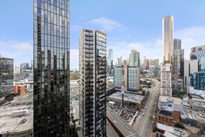 While unfurnished, the balcony offers space to step out and enjoy some fresh air or relish in sprawling skyline views.