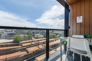 Sit on your private balcony and enjoy a meal alfresco or quick cup of coffee while watching the trains pass through.