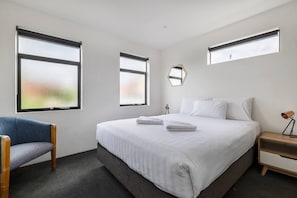 The master bedroom is light-filled, spacious and comfortable, offering a queen bed, black-out blinds, high quality linen and built-in wardrobes.