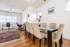 Gather around and enjoy a delicious meal in this spacious dining area
