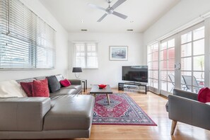 Bright and airy, this living room is perfect for spending quality time with family over your favourite show. 