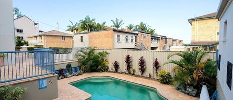 Take a relaxing dip in the communal pool after a full day of exploring around Broadwater. 