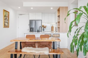 Come together around the dining table or find plenty of cafes, shops and restaurants close by.