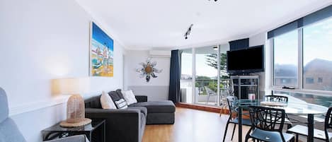 The open plan living area extends straight to the balcony, creating a lovely transition with the outdoors.