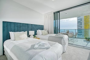 The second bedroom comes fitted with two premium single beds, ideal for those travelling in a group or with the kids.
