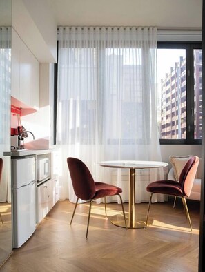 Enjoy relaxed dining at the two-seater table and make use of a dishwasher for easy clean-up. 
