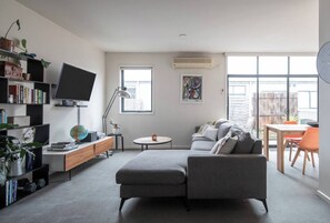 A cosy and inviting living room, perfect for unwinding after a day of exploration.
