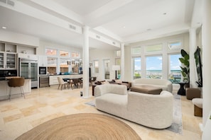 Open concept elegant beach home with views to the beach!