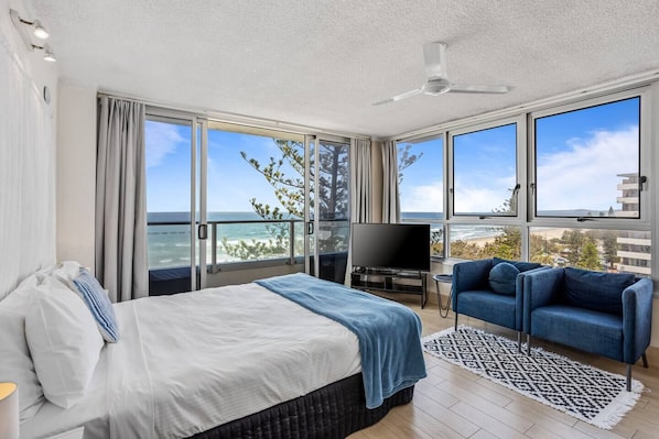 Wake up to breathtaking views across the ocean from your plush studio apartment with a charming balconet on the beachfront at Surfers Paradise.