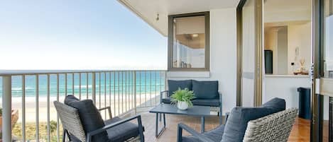 Take in views directly over the sand from the sunny private balcony. This is an idyllic spot to sip your morning coffee watching as the sun rises above the coast.

