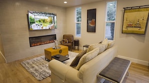 living Room - 65"TV & Elec. fireplace
