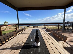 Rear Decking & Dining Area with Beach Frontage