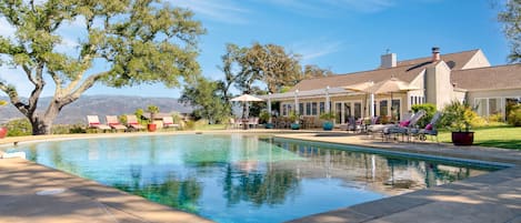 Private pool with stunning views, a hot tub, and plenty of lounge space.