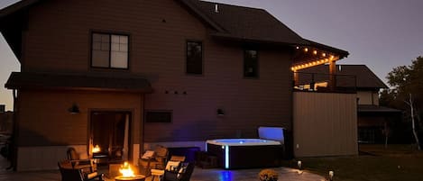 Relax: Backyard Patio - An oversized, wrap around patio takes your outdoor experience to another level. Mt. Maurice is the backdrop as you indulge yourself in the 7 person spa or gather around the fire-pit. Reflect, rejuvenate, revel in the outdoors.
