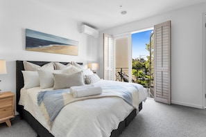 Spacious bedroom with balcony