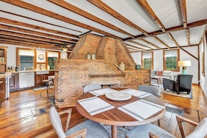 Cottage dining area adjacent to kitchen, seating for 4